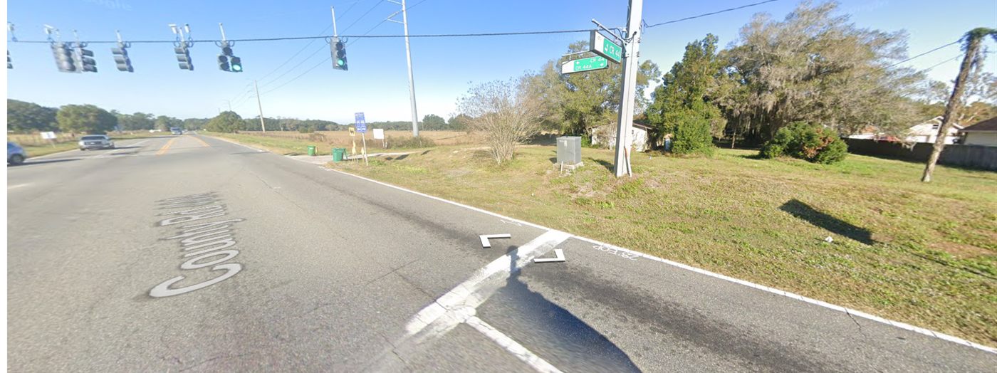CR 44 at the signal looking west, with the parcel frontage on the right